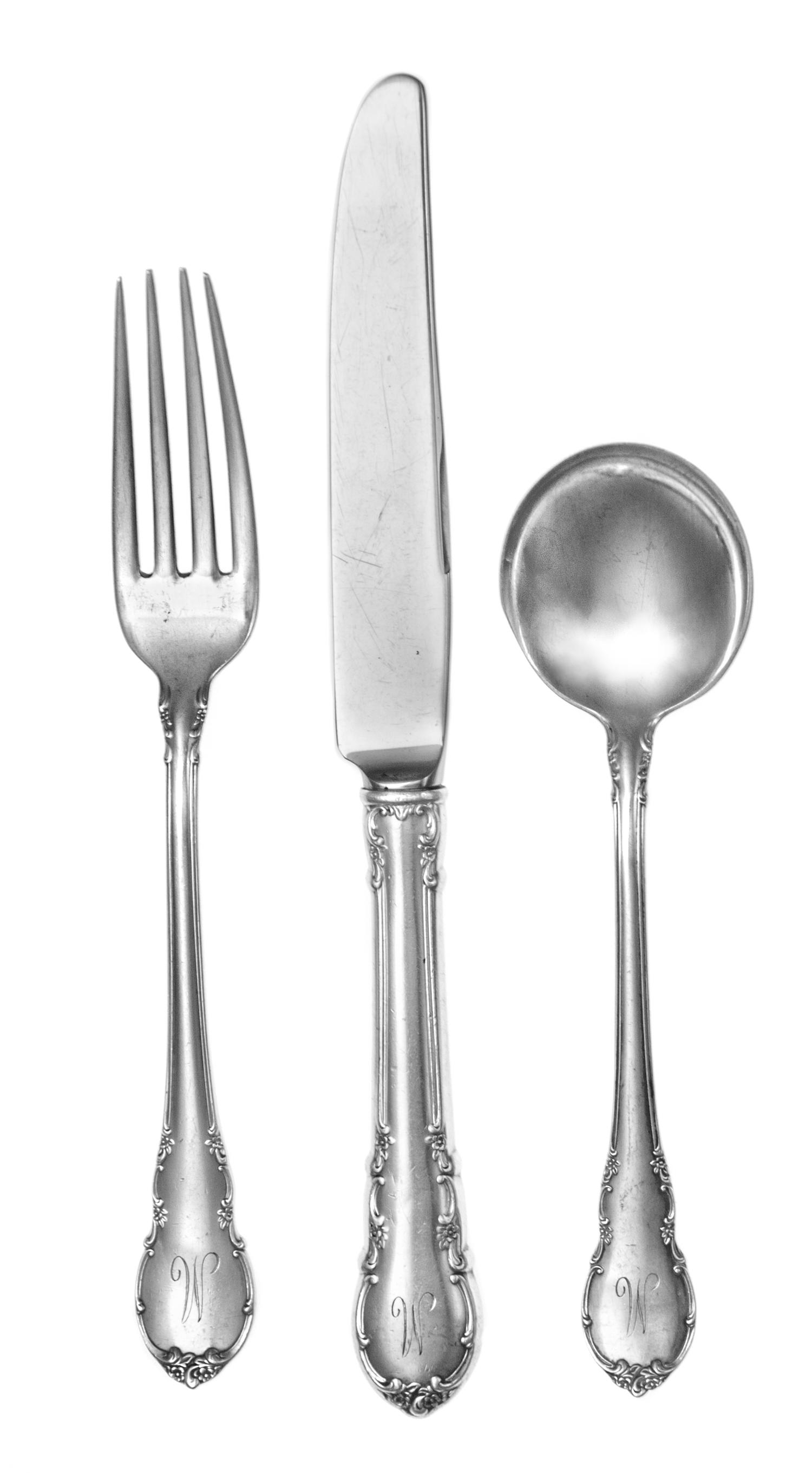 An American Silver Flatware Service, Lunt Silversmiths, Greenfield, MA, comprising: 12 dinner knives 5 dinner forks 11 luncheon forks 1