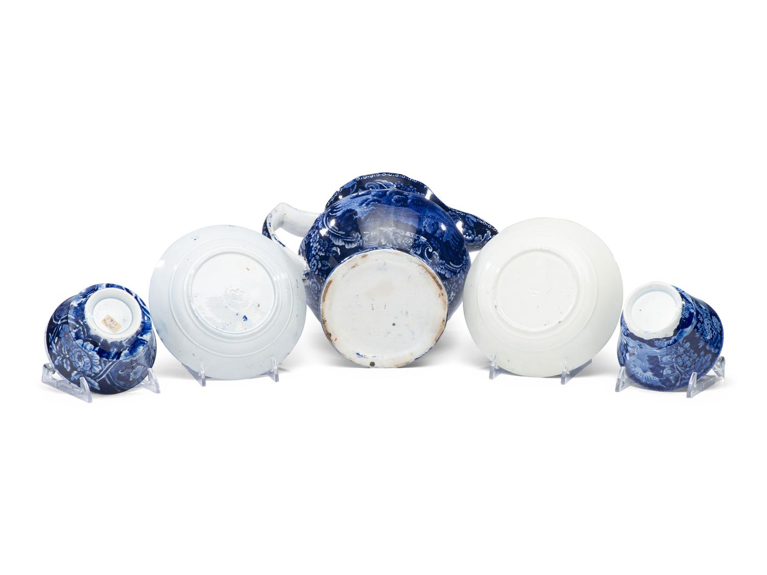A Historical Blue Staffordshire Pitcher and Two Cups with Saucers
