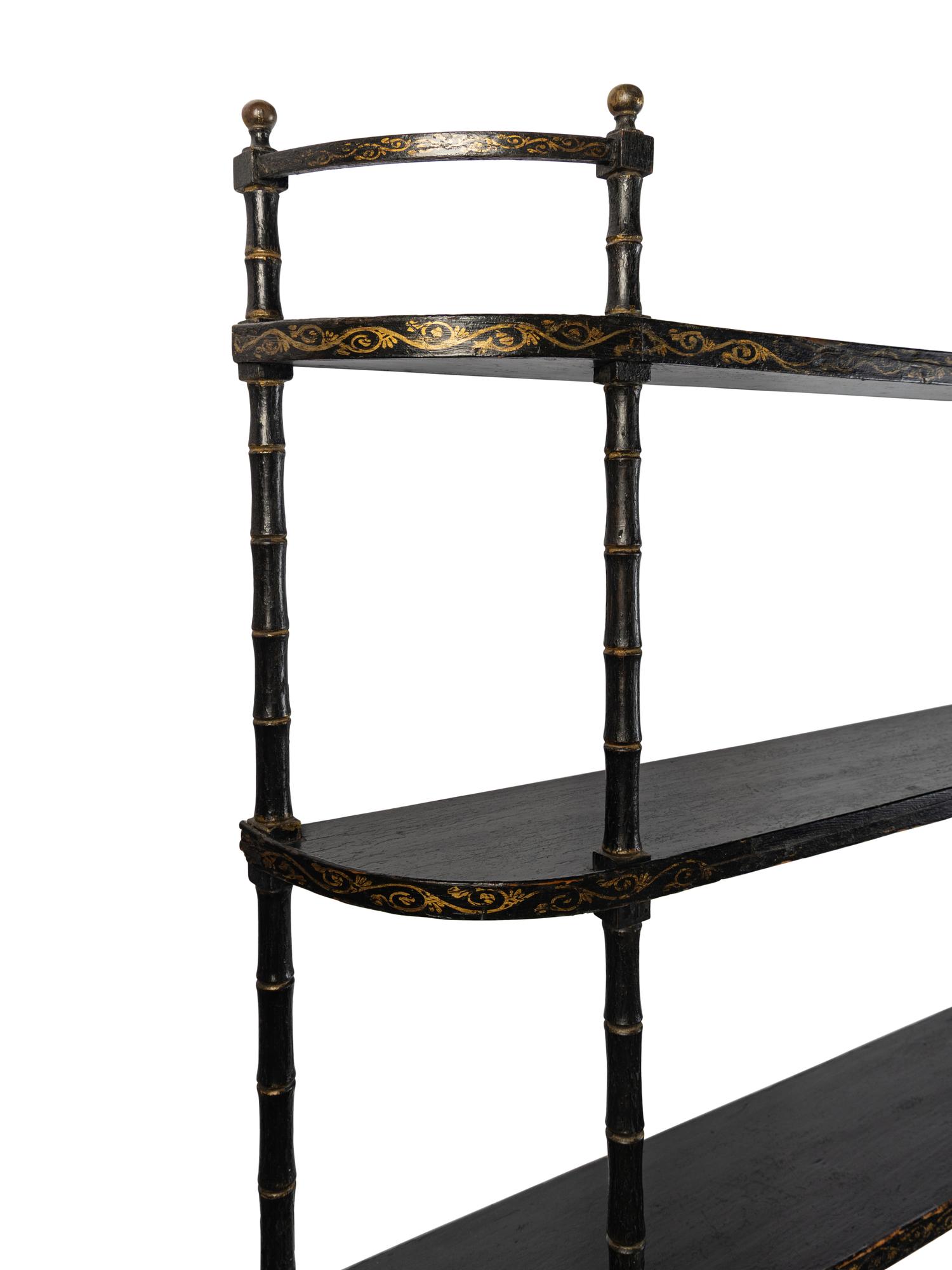 A Victorian Ebonized and Parcel-Gilt Hanging Étagère