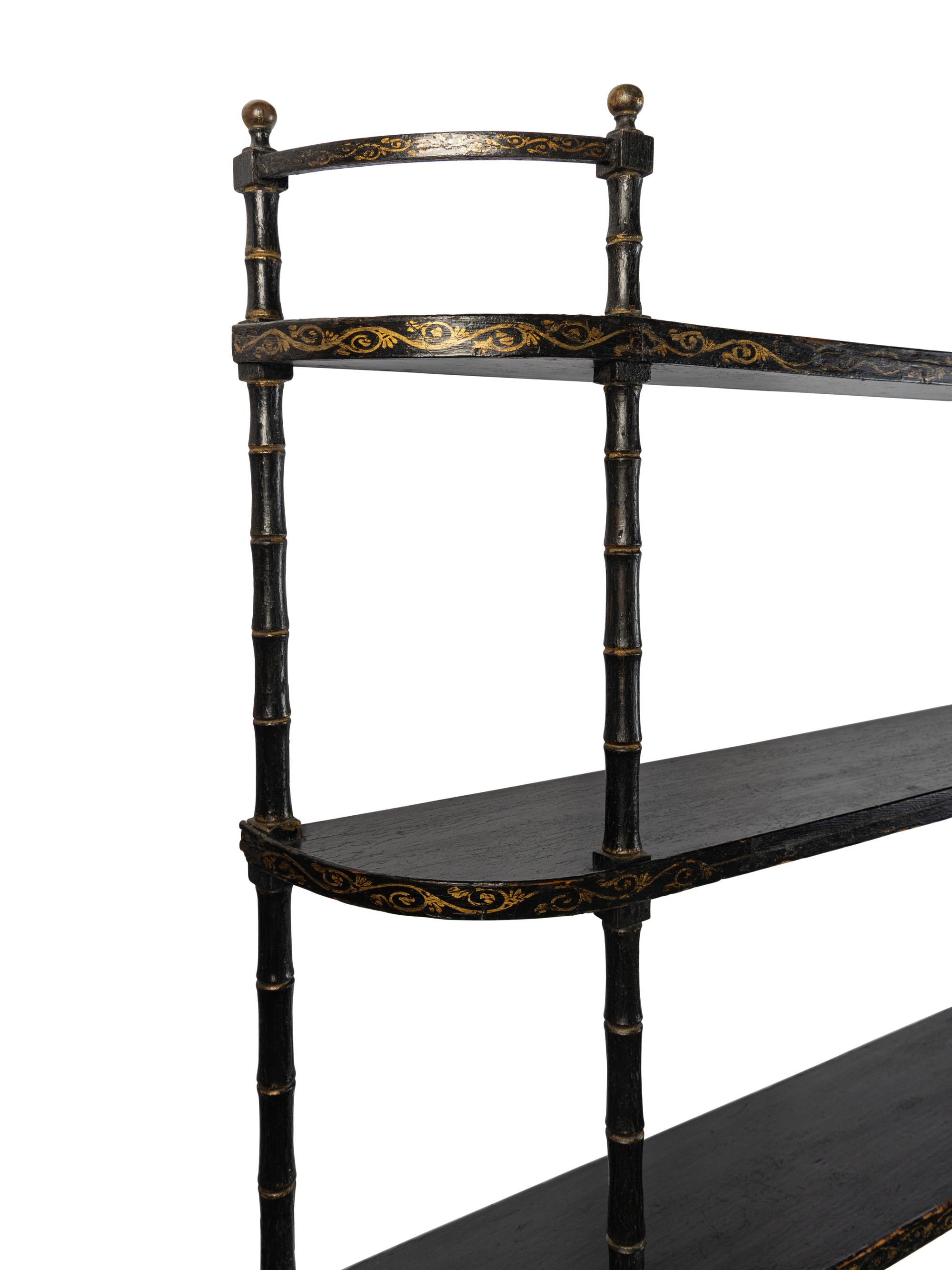 A Victorian Ebonized and Parcel-Gilt Hanging Étagère