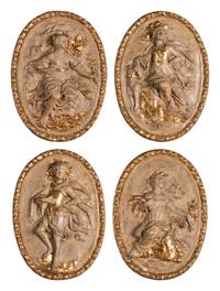 Four Italian Neoclassical Painted and Parcel-Gilt Papier-Mâché Relief Plaques