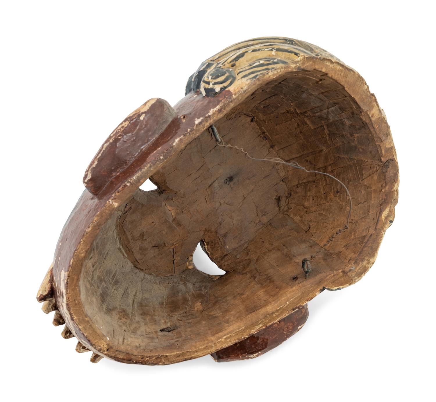 A Mexican Carved and Polychromed Wood Mask