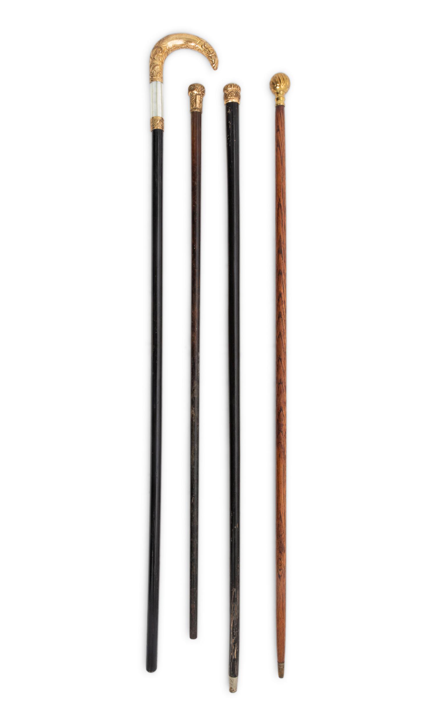 A Collection of Gold Mounted Canes