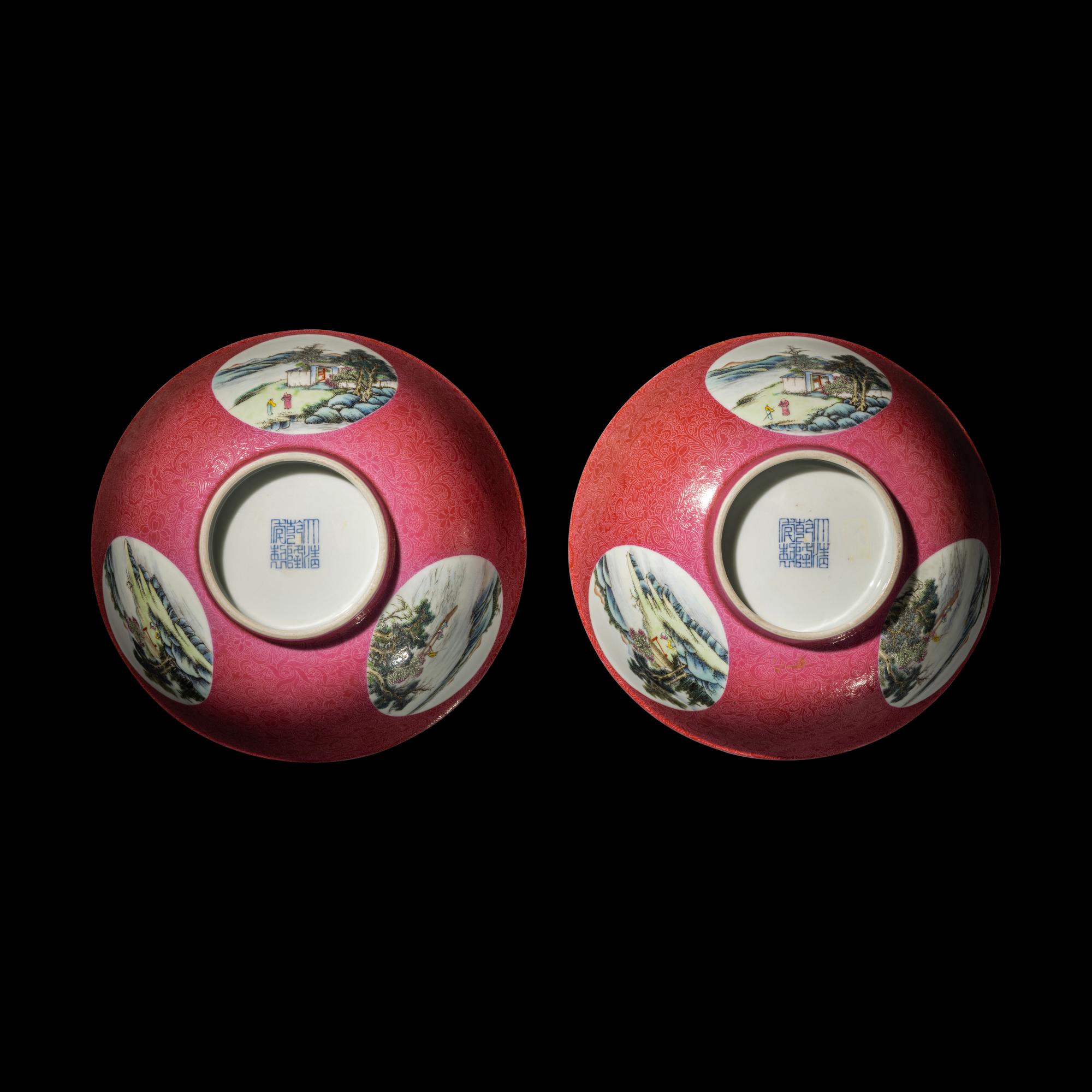 A Pair of Chinese Famille Rose Ruby Ground Porcelain 'Landscapes' Bowls, 20th Century 近代 胭脂紅地軋道開光山水圖碗一對