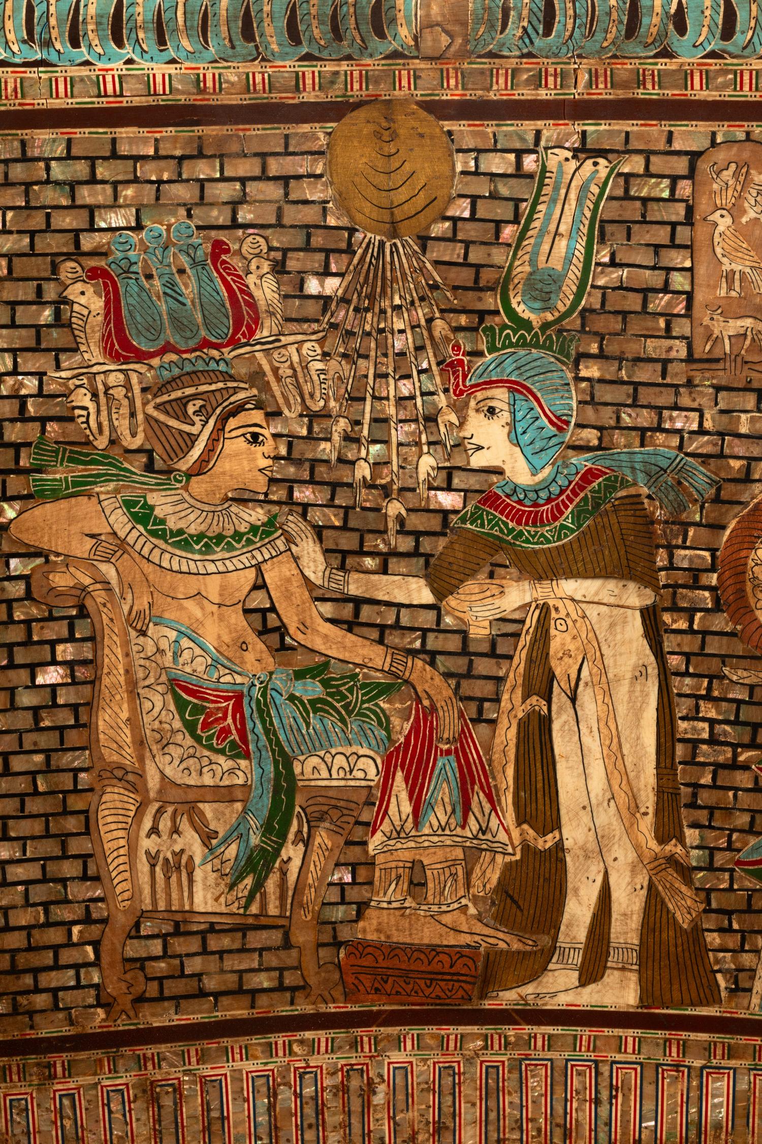 An Egyptian Style Painted Giltwood and Mother-of-Pearl Inlaid Throne Chair