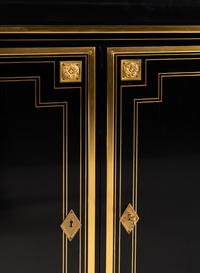 A Pair of Custom Gilt Bronze Mounted Ebonized Cabinets