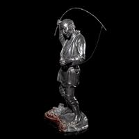 A Japanese Bronze Figure of a Fisherman by Seiko, Meiji/Taisho Period