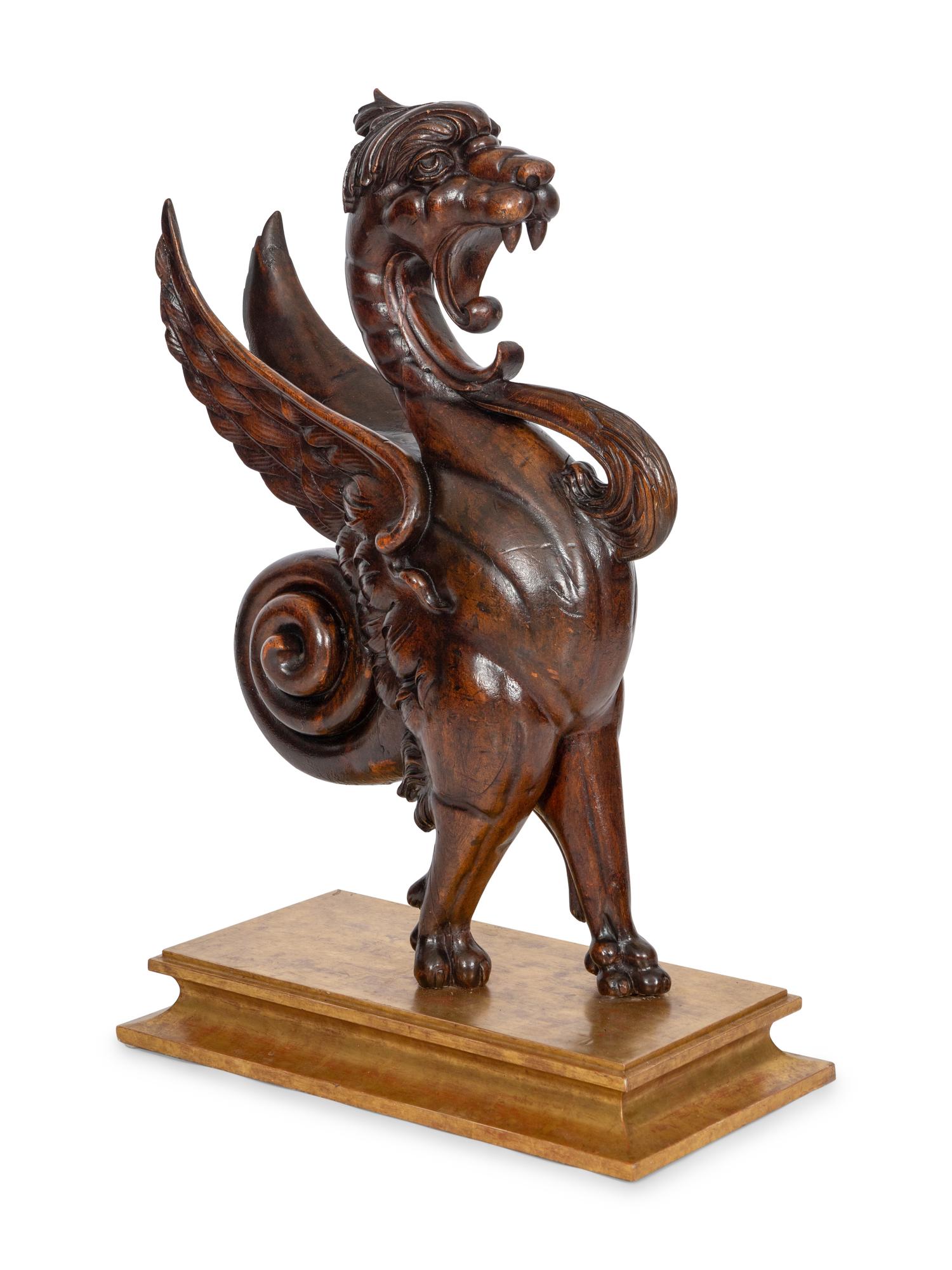 An American Carved Walnut Griffin Newel Figure