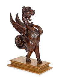 An American Carved Walnut Griffin Newel Figure
