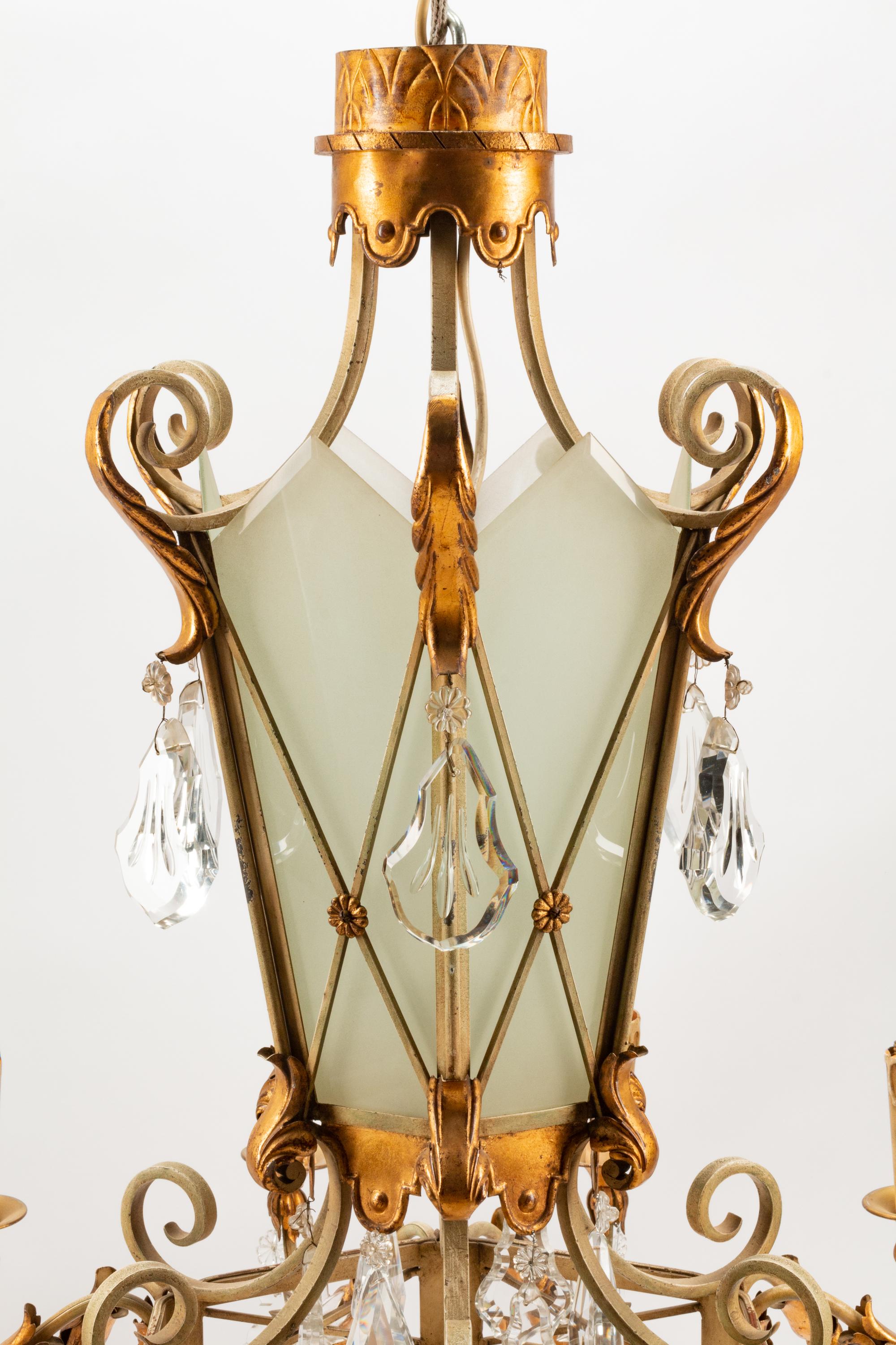 An Italian Painted Iron and Tôle Twelve-Light Chandelier