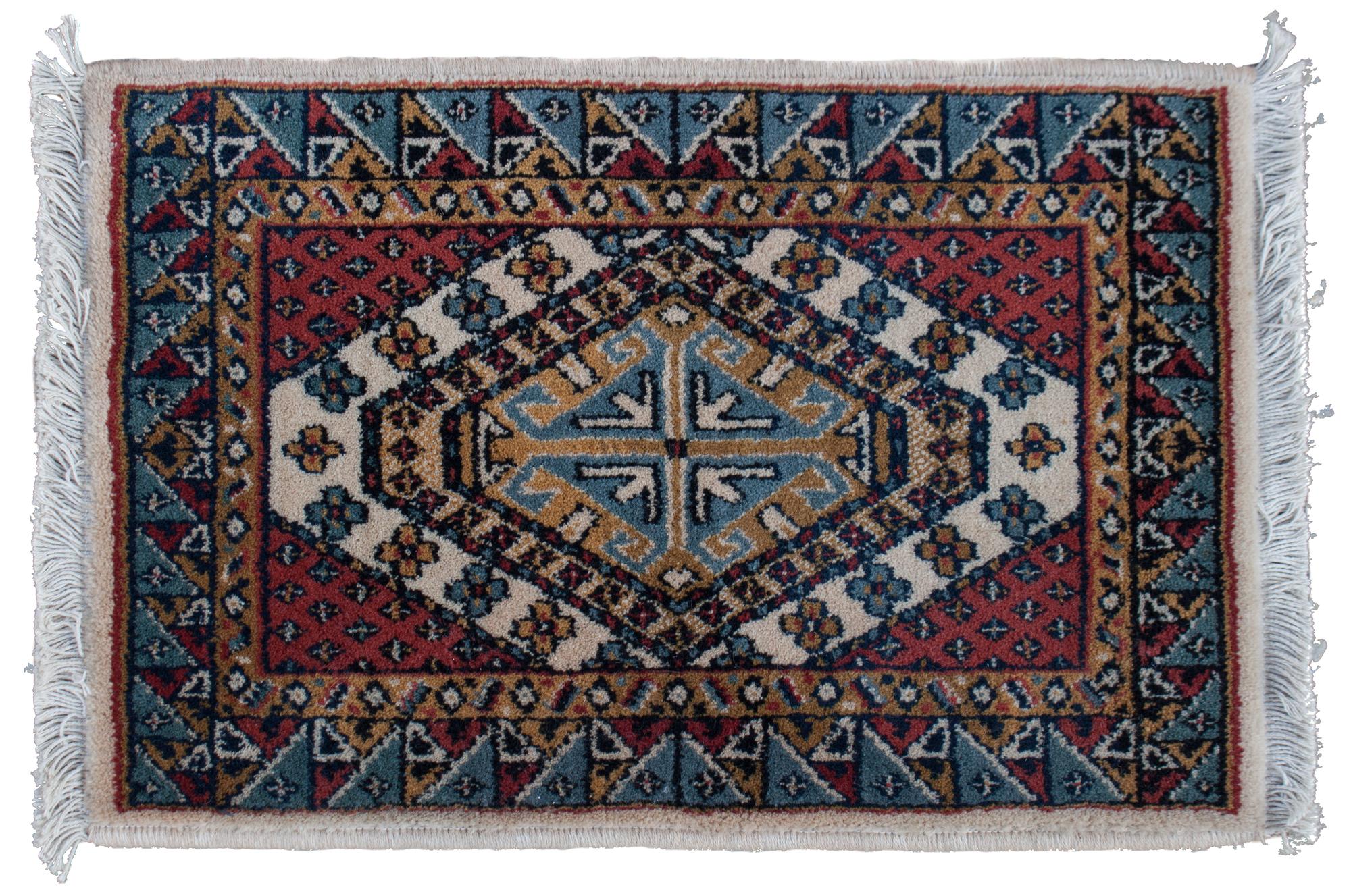 Two Wool Prayer Rugs Largest 2 feet x 1 foot 7 inches.