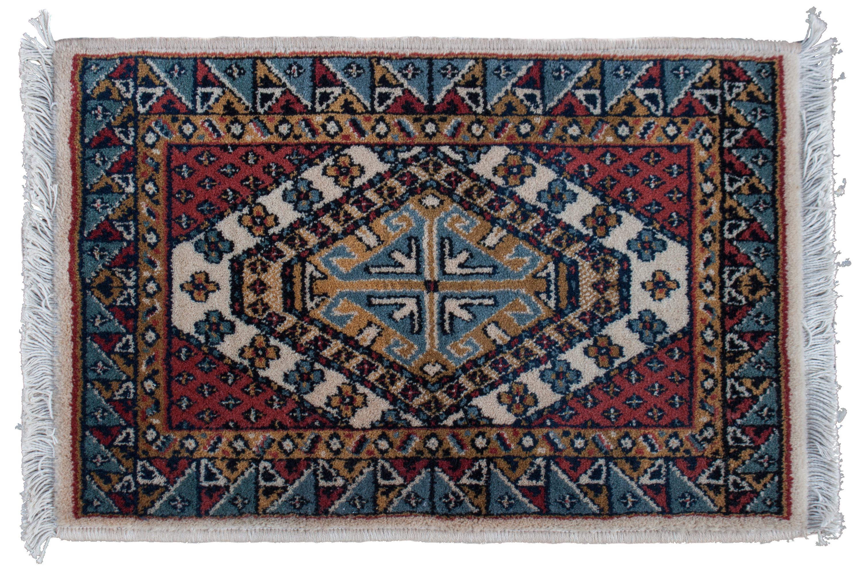 Two Wool Prayer Rugs Largest 2 feet x 1 foot 7 inches.