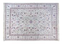 A Tabriz Wool Rug 13 feet 10 inches x 9 feet 10 inches.