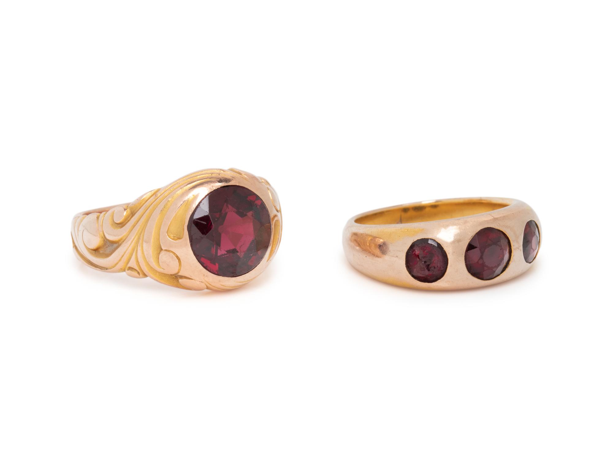 COLLECTION OF YELLOW GOLD AND GARNET RINGS