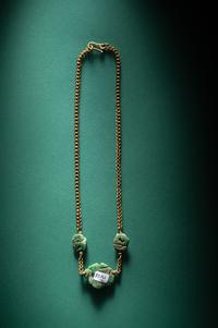 Three Maya Jade Parrot Pendants — Strung on a gold necklace