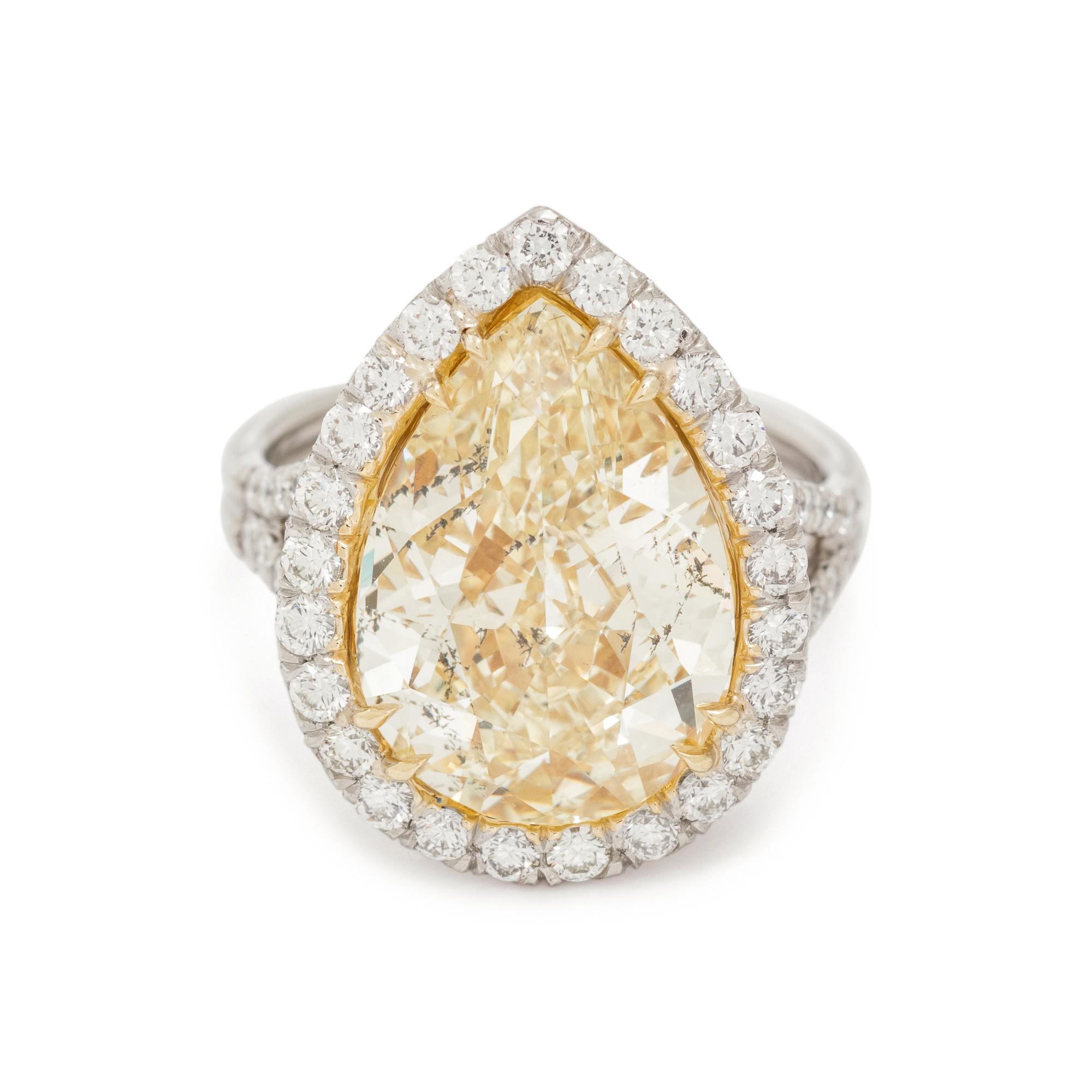 FANCY YELLOW DIAMOND AND DIAMOND RING