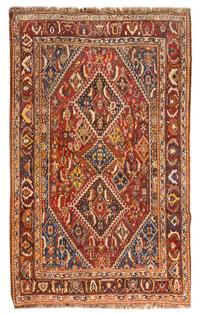 A Qashqai Wool Rug 7 feet 8 inches x 5 feet. — CIRCA 1900