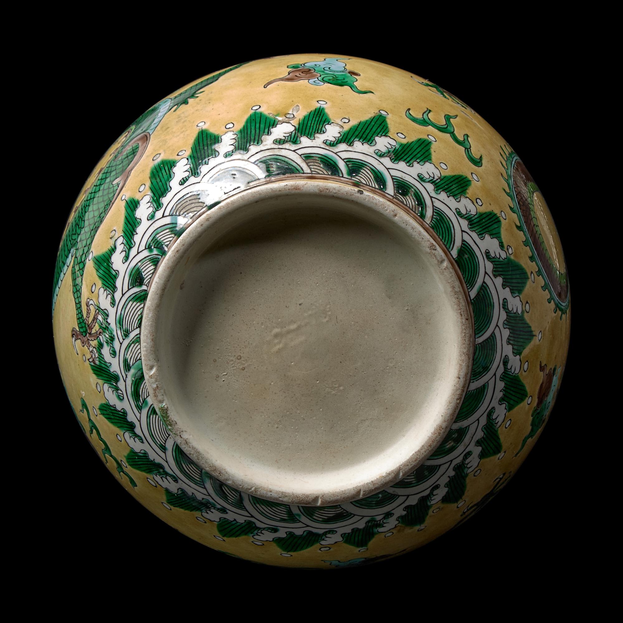 A Chinese Yellow Ground Famille Verte 'Dragons' Vase, Late Qing to Republic Period 晚清-民國 黃地素三彩龍紋瓶