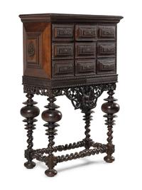 A Portuguese Baroque Style Carved Walnut Cabinet on Stand