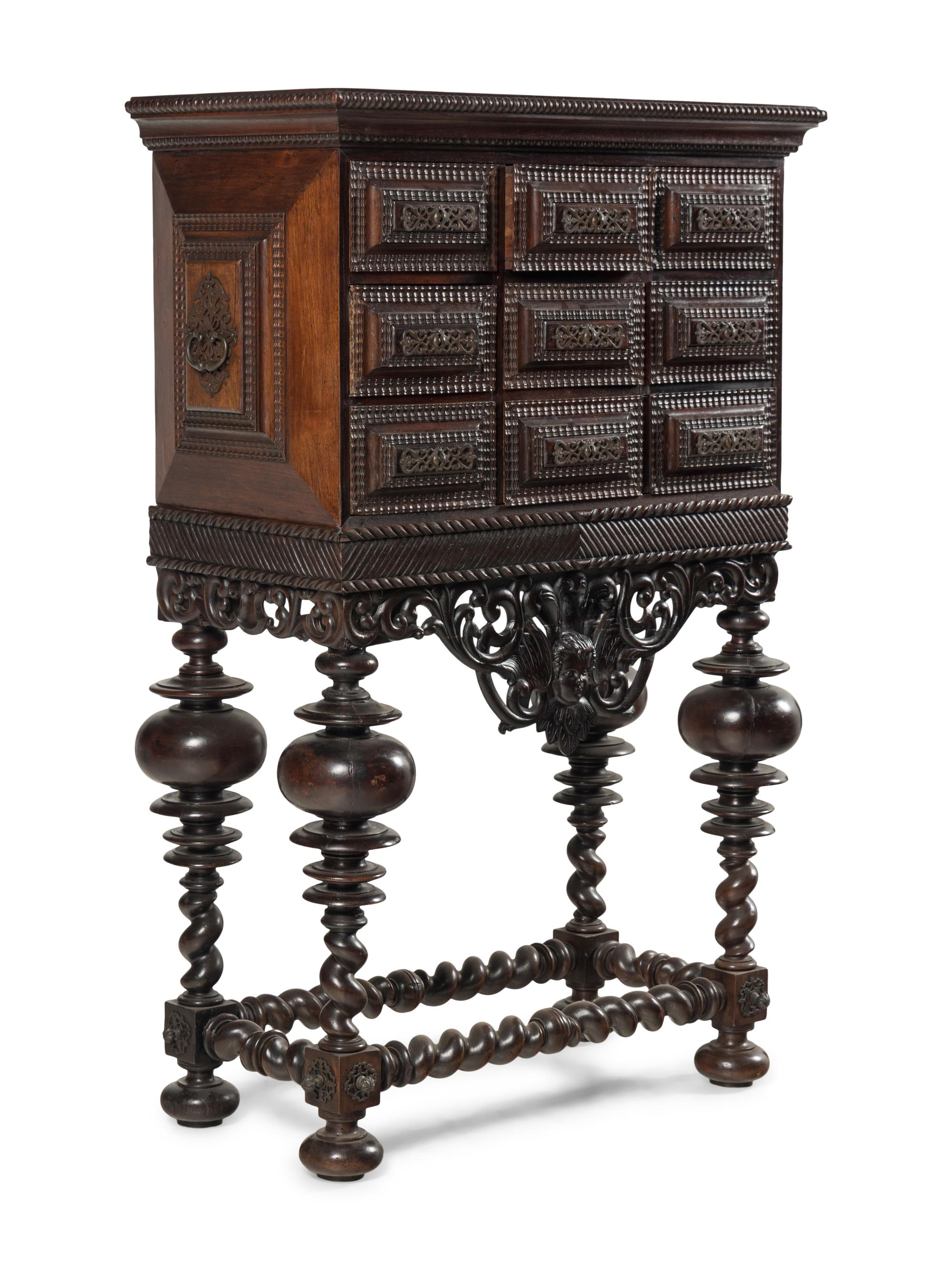 A Portuguese Baroque Style Carved Walnut Cabinet on Stand