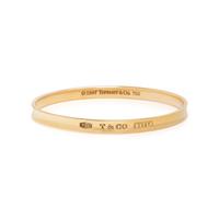 TIFFANY & CO., YELLOW GOLD ANNIVERSARY BANGLE BRACELET