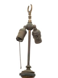 A Pair of Regency Style Ebonized and Gilt Tole Table Lamps
