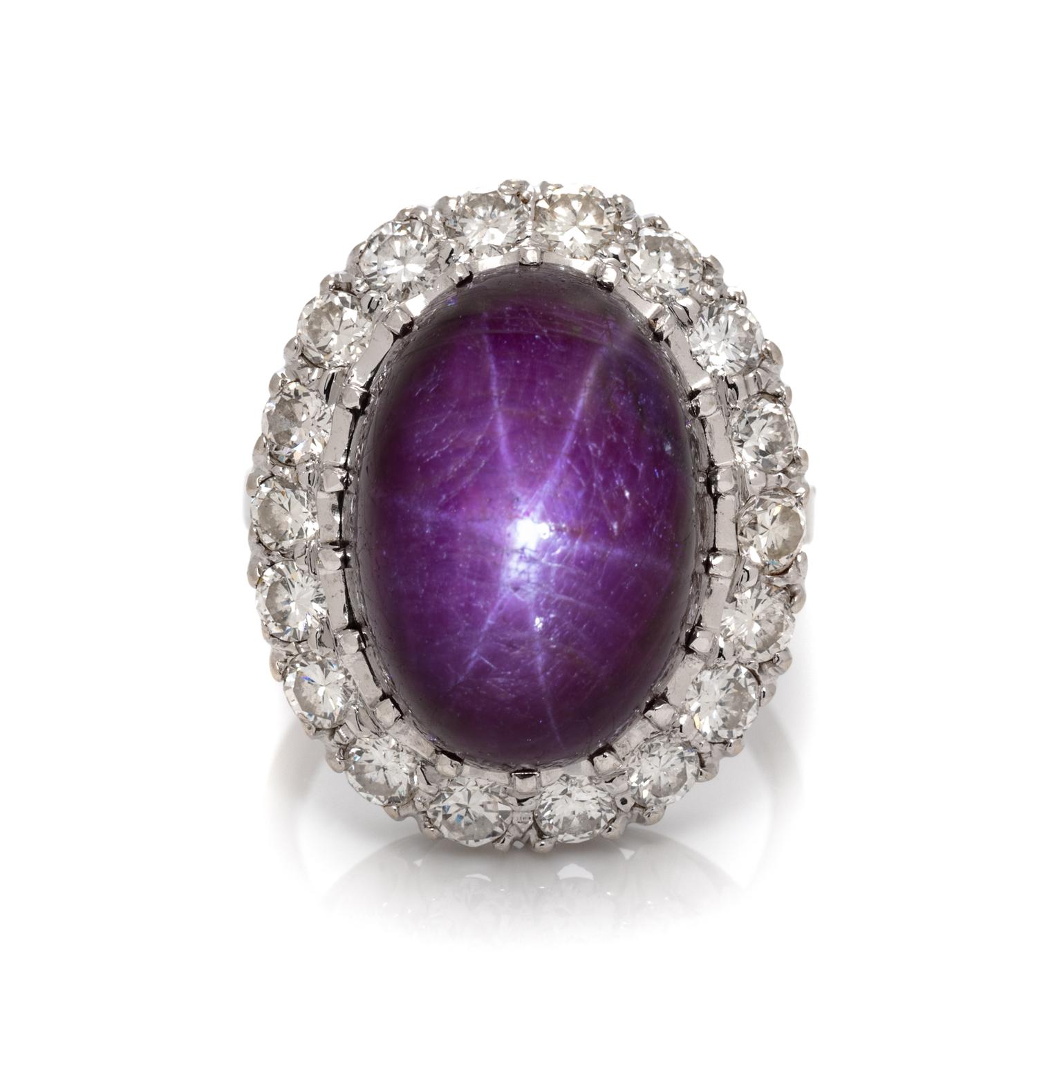 A 14 Karat White Gold, Star Ruby and Diamond Ring, 7.30 dwts.