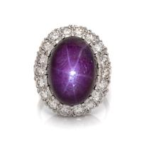 A 14 Karat White Gold, Star Ruby and Diamond Ring, 7.30 dwts.