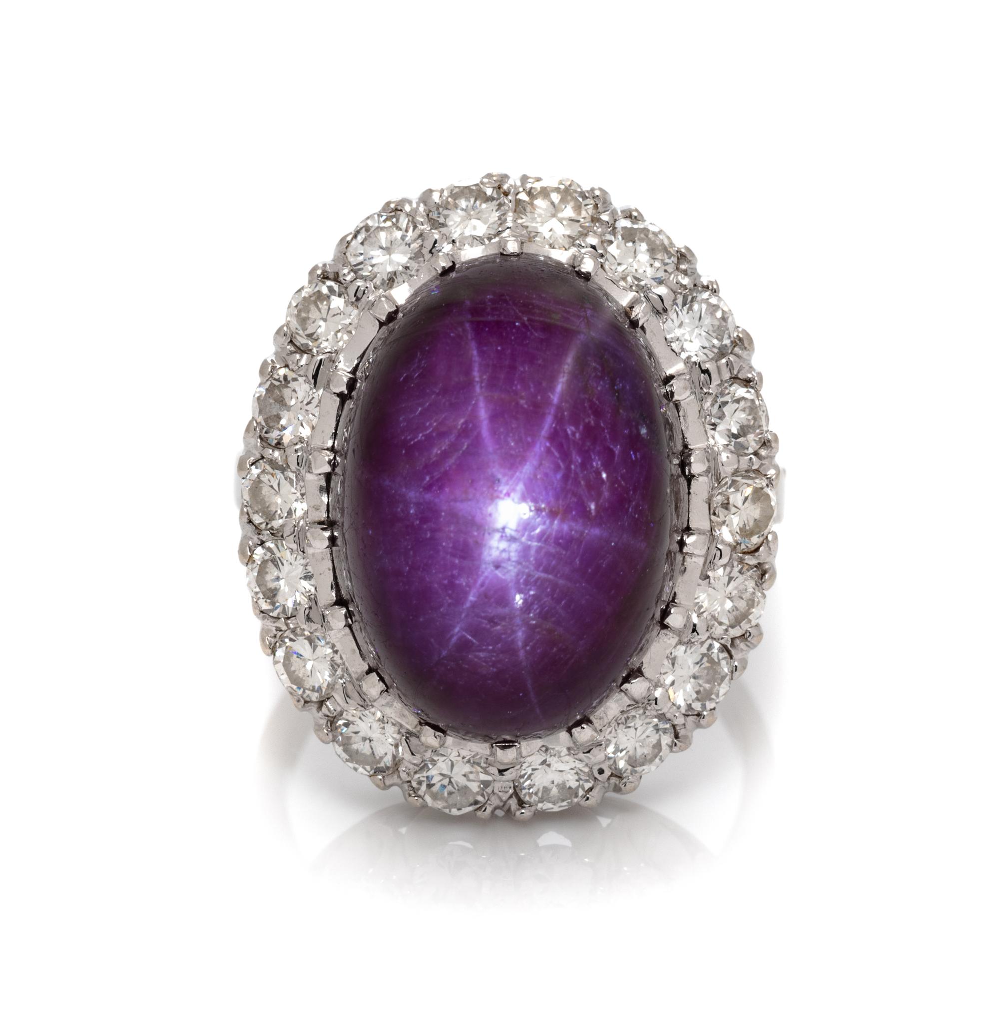 A 14 Karat White Gold, Star Ruby and Diamond Ring, 7.30 dwts.