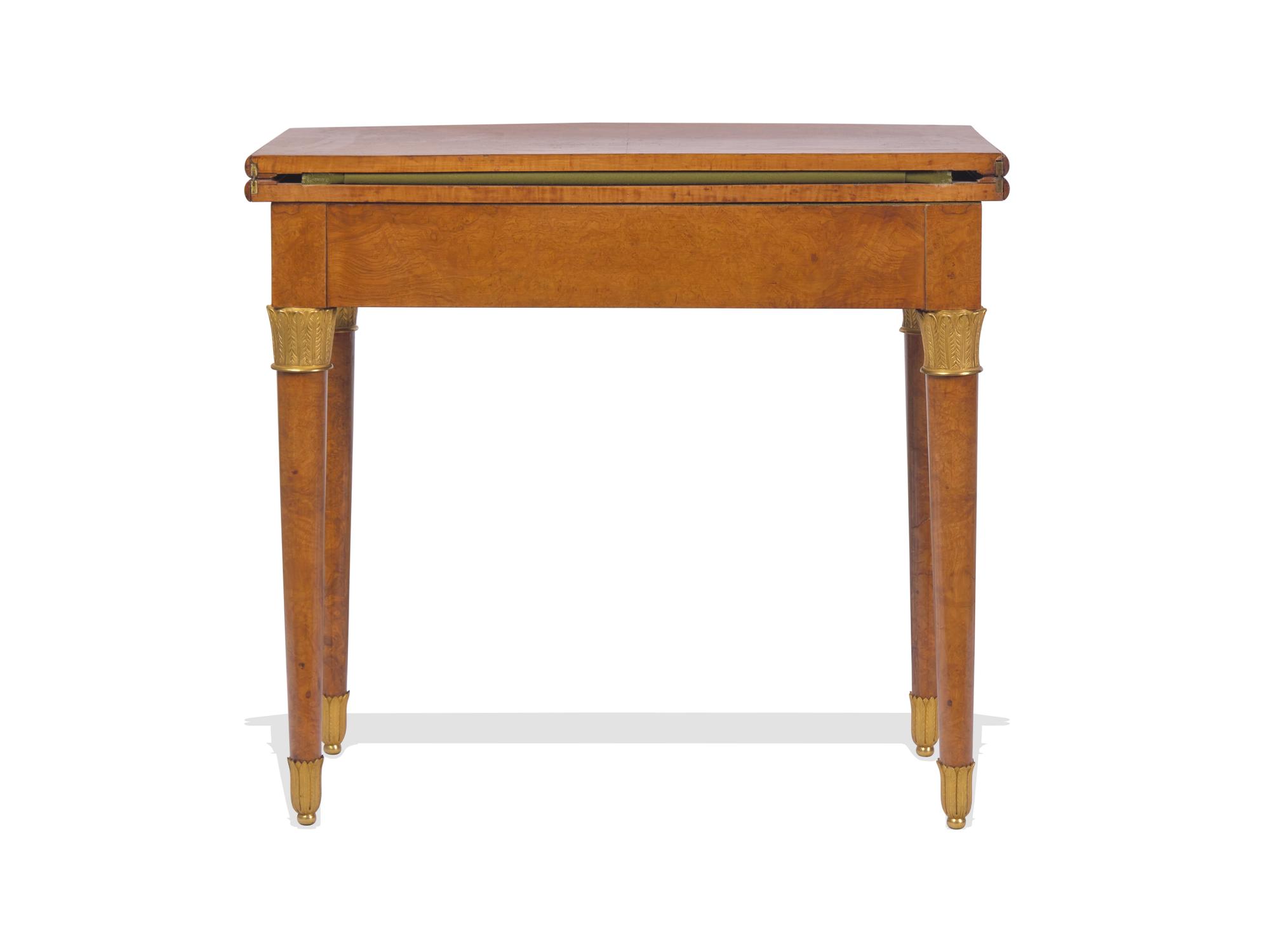 A Charles X Karelian Birch and Gilt-Bronze Mounted Flip-Top Games Table