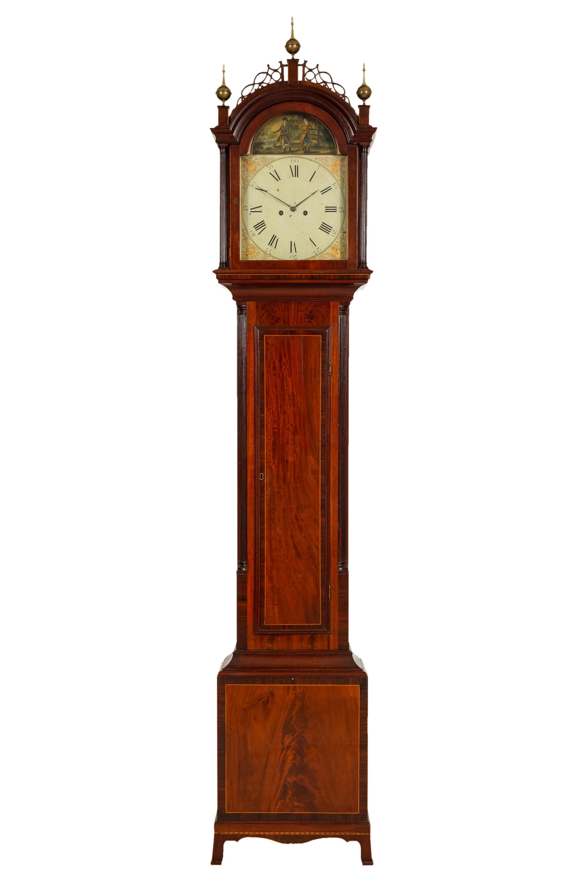 A Federal Carved, Inlaid and Figured Mahogany Tall Case Clock