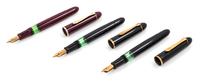 A Collection of Three Vintage Pelikan '140' Fountain Pens Length 4 7/8 inches.