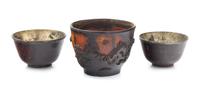 Three Chinese Carved Coconut Shell Wine Cups Diameter of largest 3 inches. — 19TH CENTURY