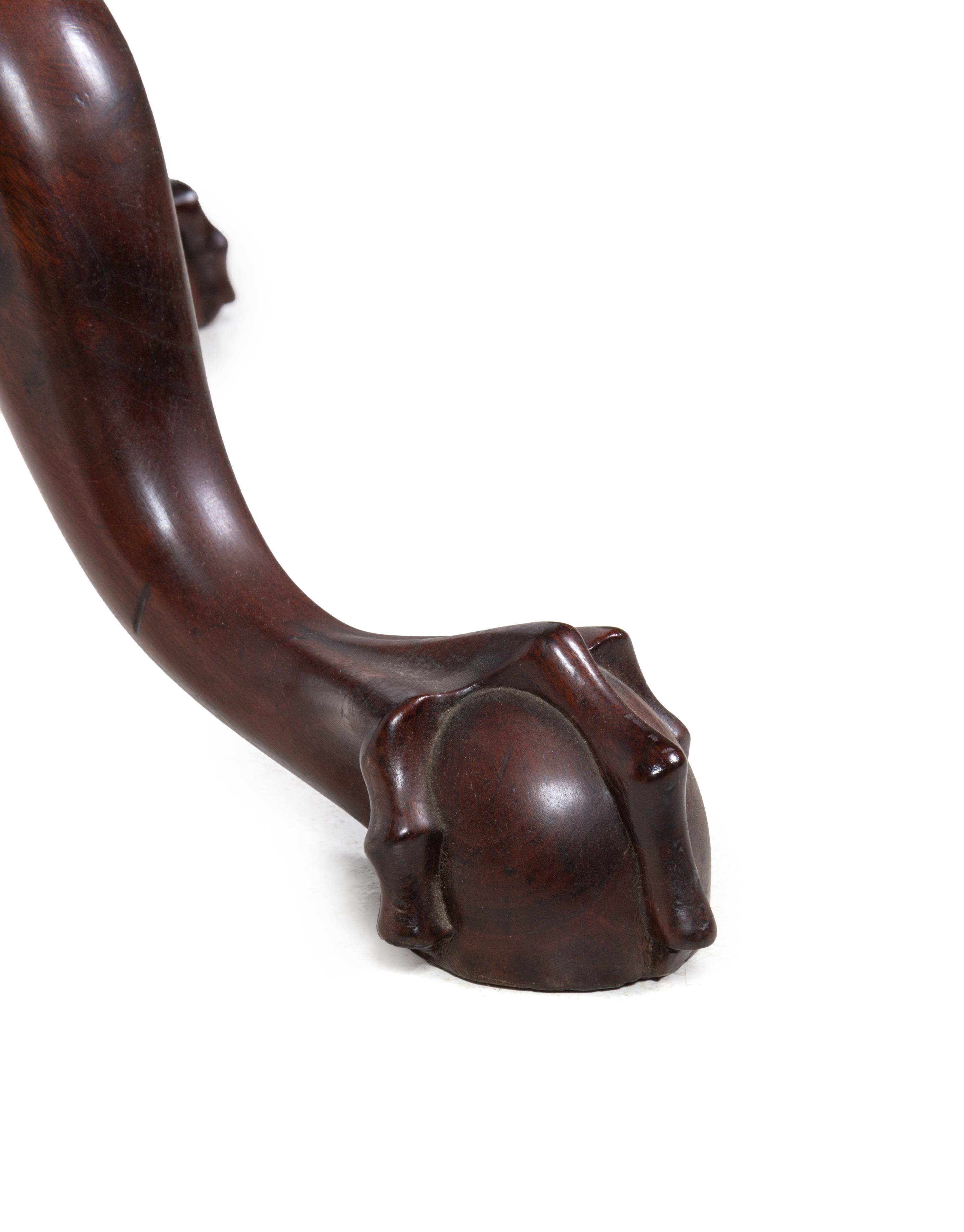 A Chippendale Carved Mahogany Tilt-Top Tea Table