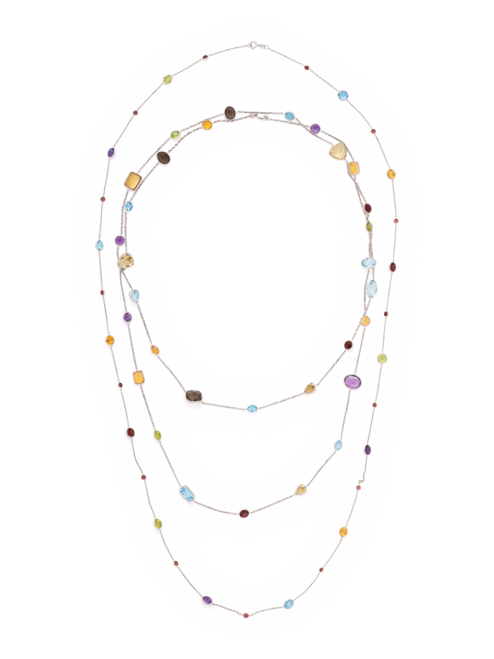 COLLECTION OF WHITE GOLD AND MULTIGEM LONGCHAIN NECKLACES