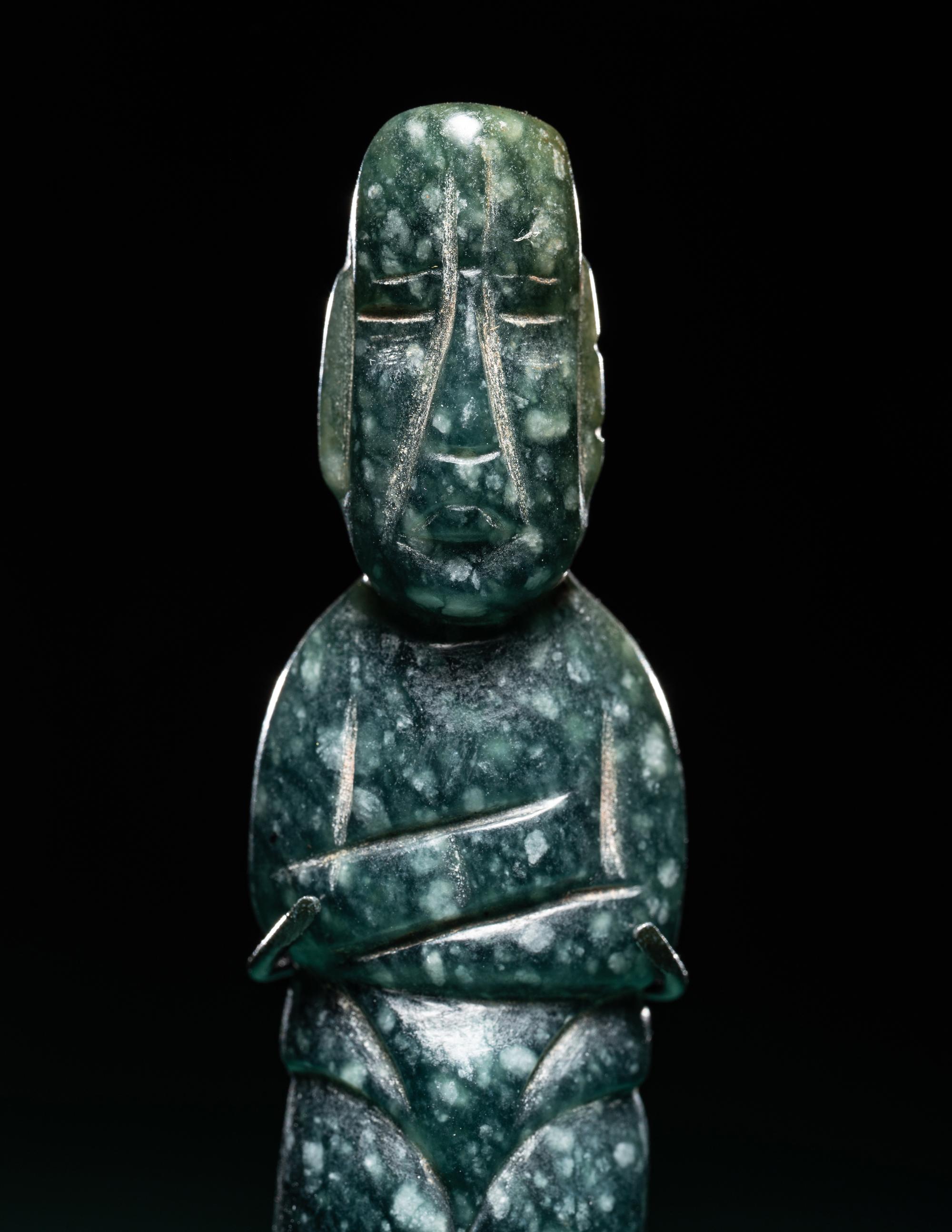 An Olmec Jade Pounding Figure