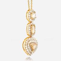 A diamond and gold pendant necklace