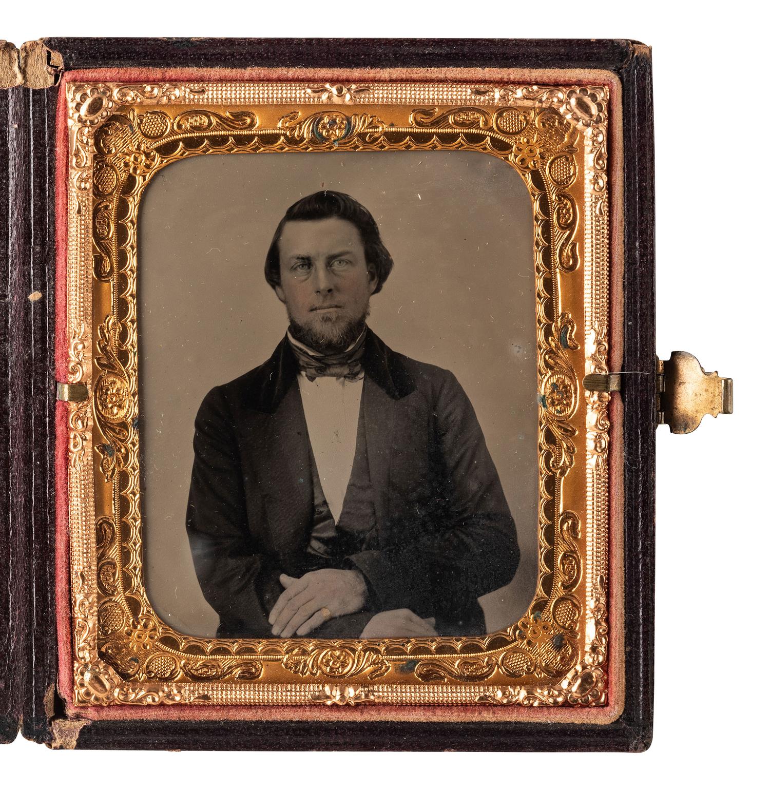 BIRD ALERT! A pair of tintype portraits of the same woman holding a dove.