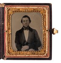 BIRD ALERT! A pair of tintype portraits of the same woman holding a dove.