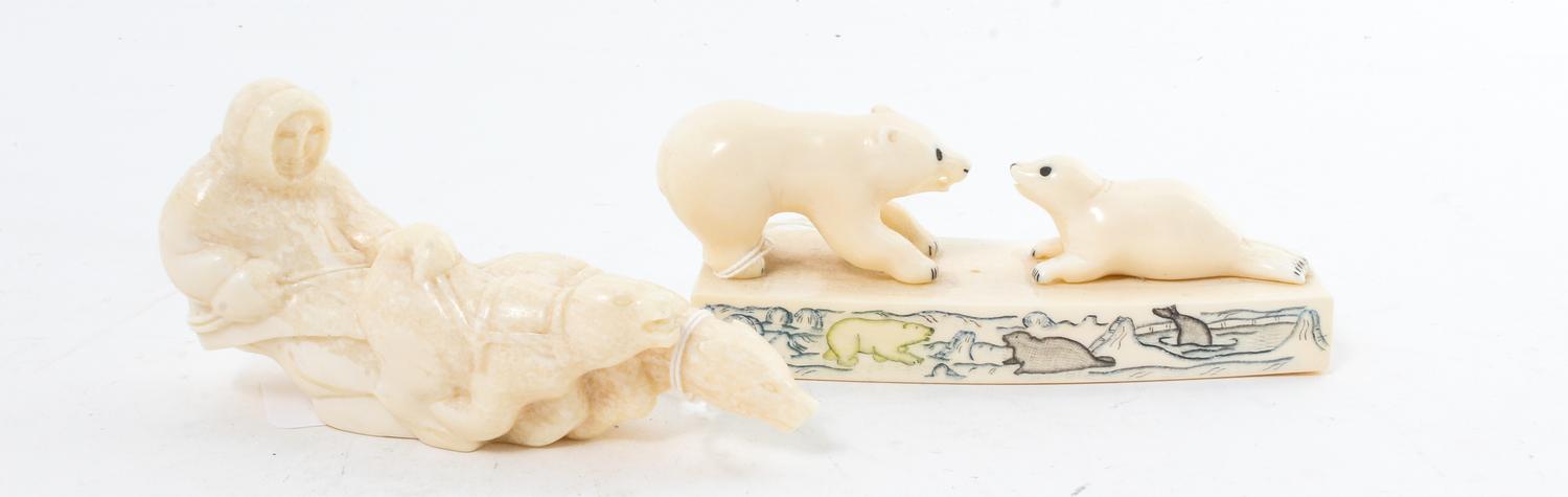 A Pair of Walrus Tusk Figures Length of longest 5 inches. — 20TH CENTURY