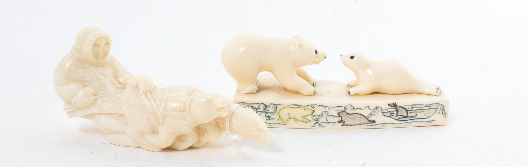 A Pair of Walrus Tusk Figures Length of longest 5 inches. — 20TH CENTURY