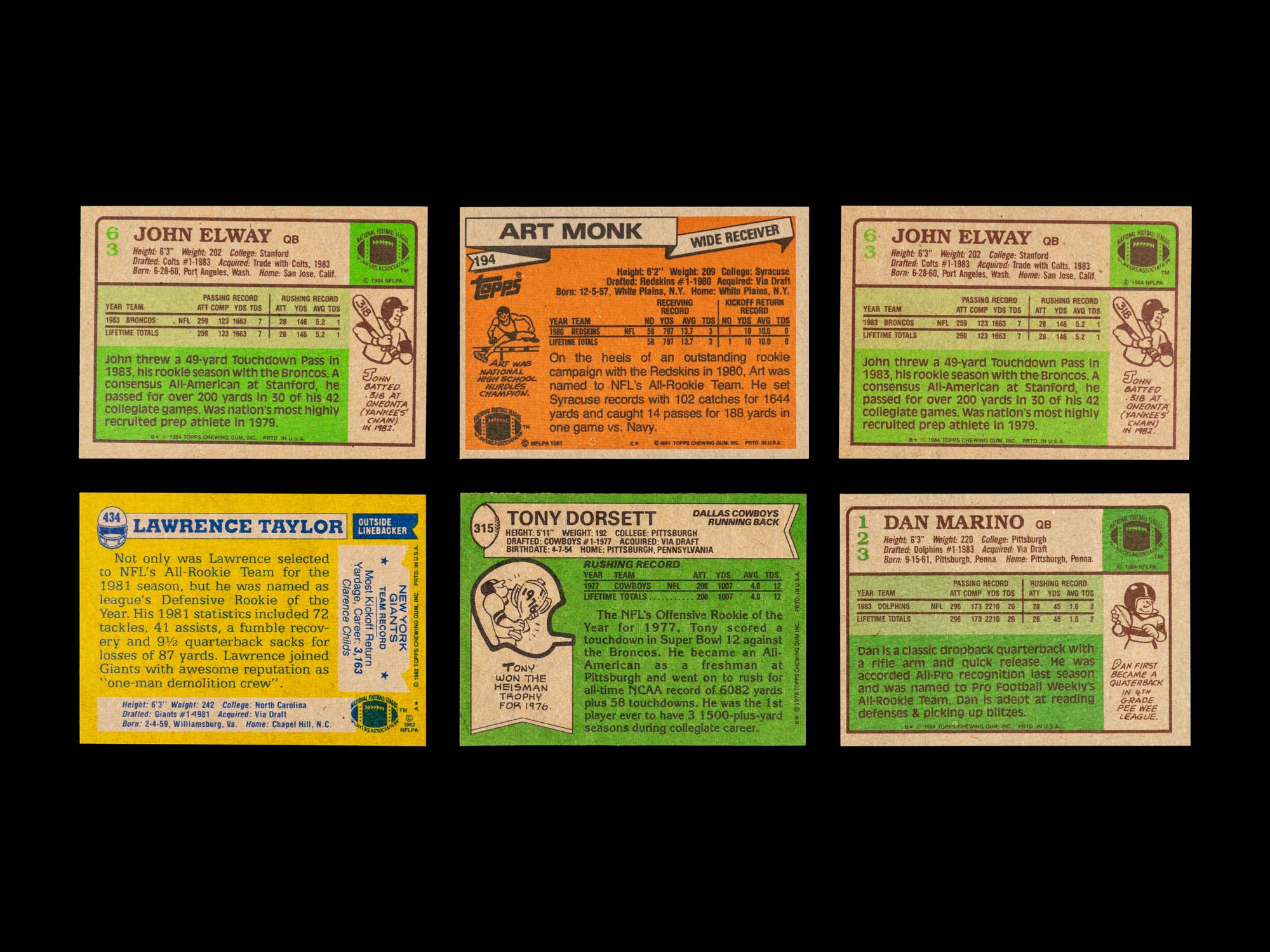 A Group of Six Topps Football Hall of Fame Rookie Cards (Including Tony Dorsett, John Elway, Dan Marino, Art Monk, Lawrence Taylor)