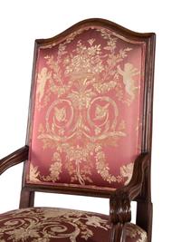 A Pair of Régence Style Walnut Fauteuils