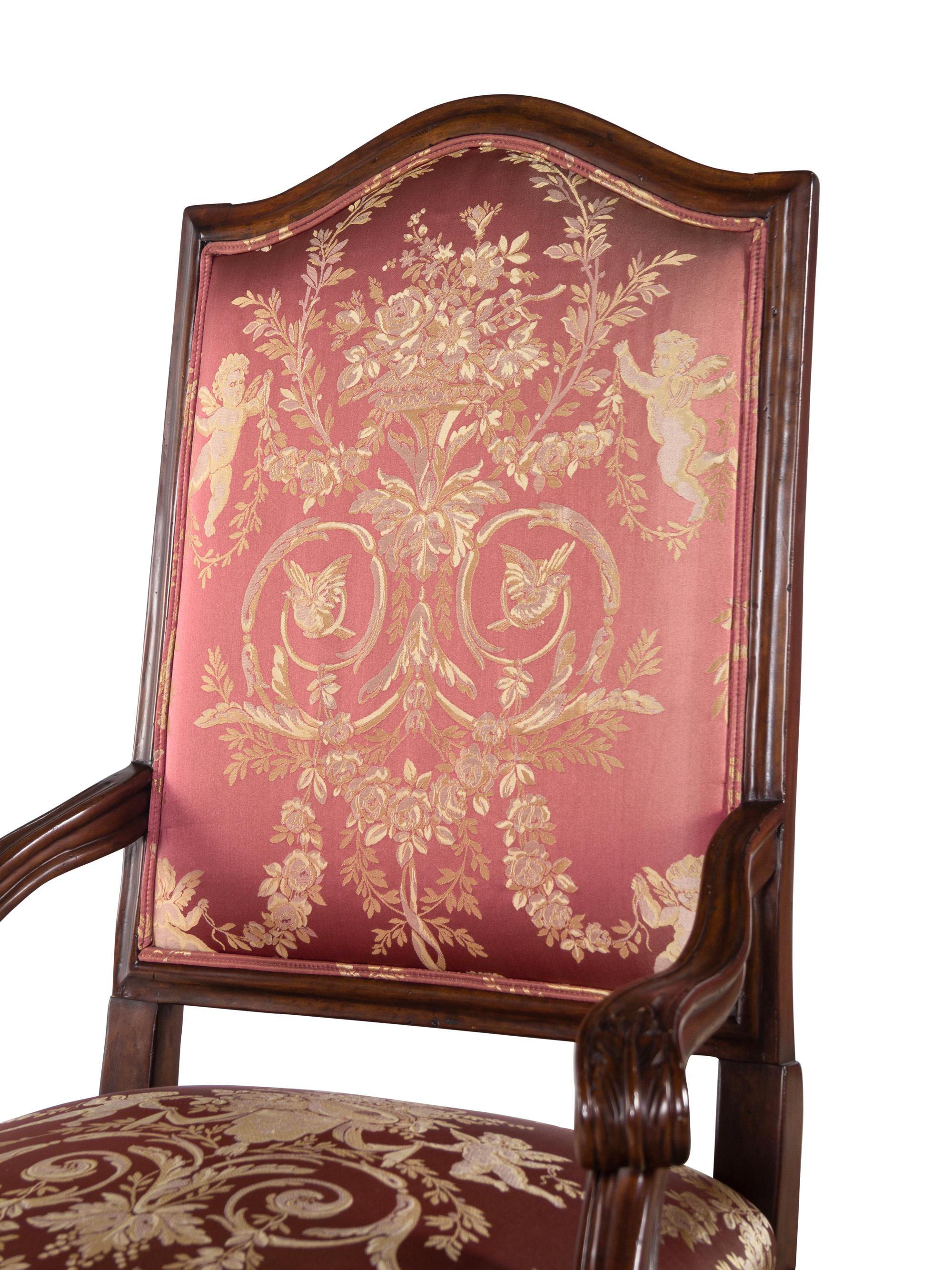 A Pair of Régence Style Walnut Fauteuils