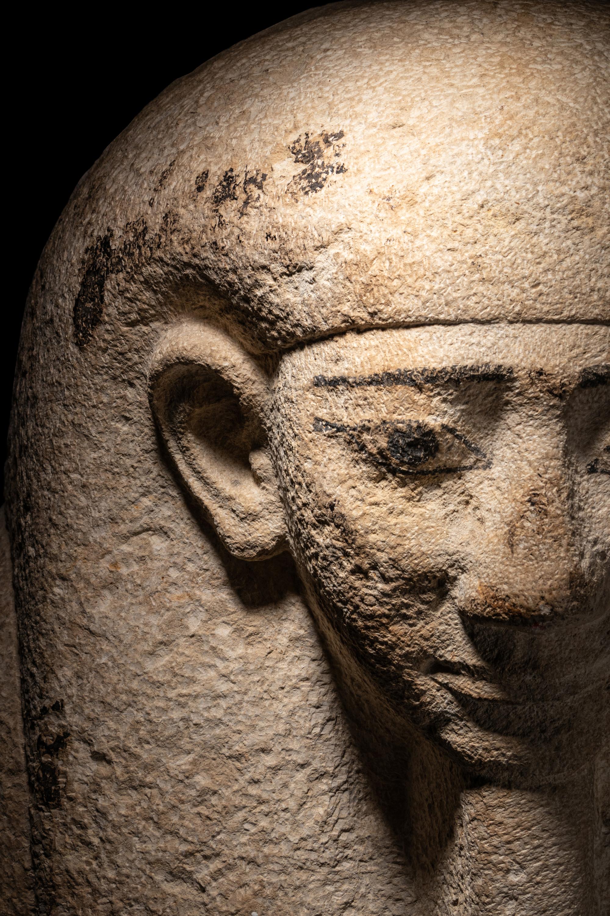 An Egyptian Limestone Sarcophagus Lid