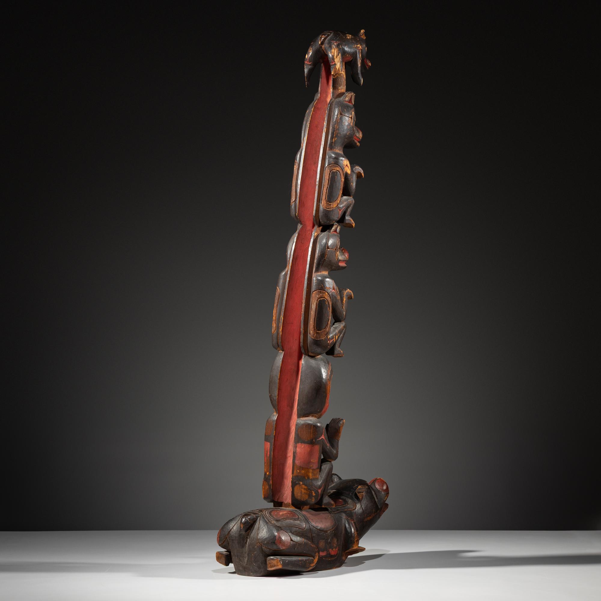 Haida Carved Totem Pole and Bear Cub