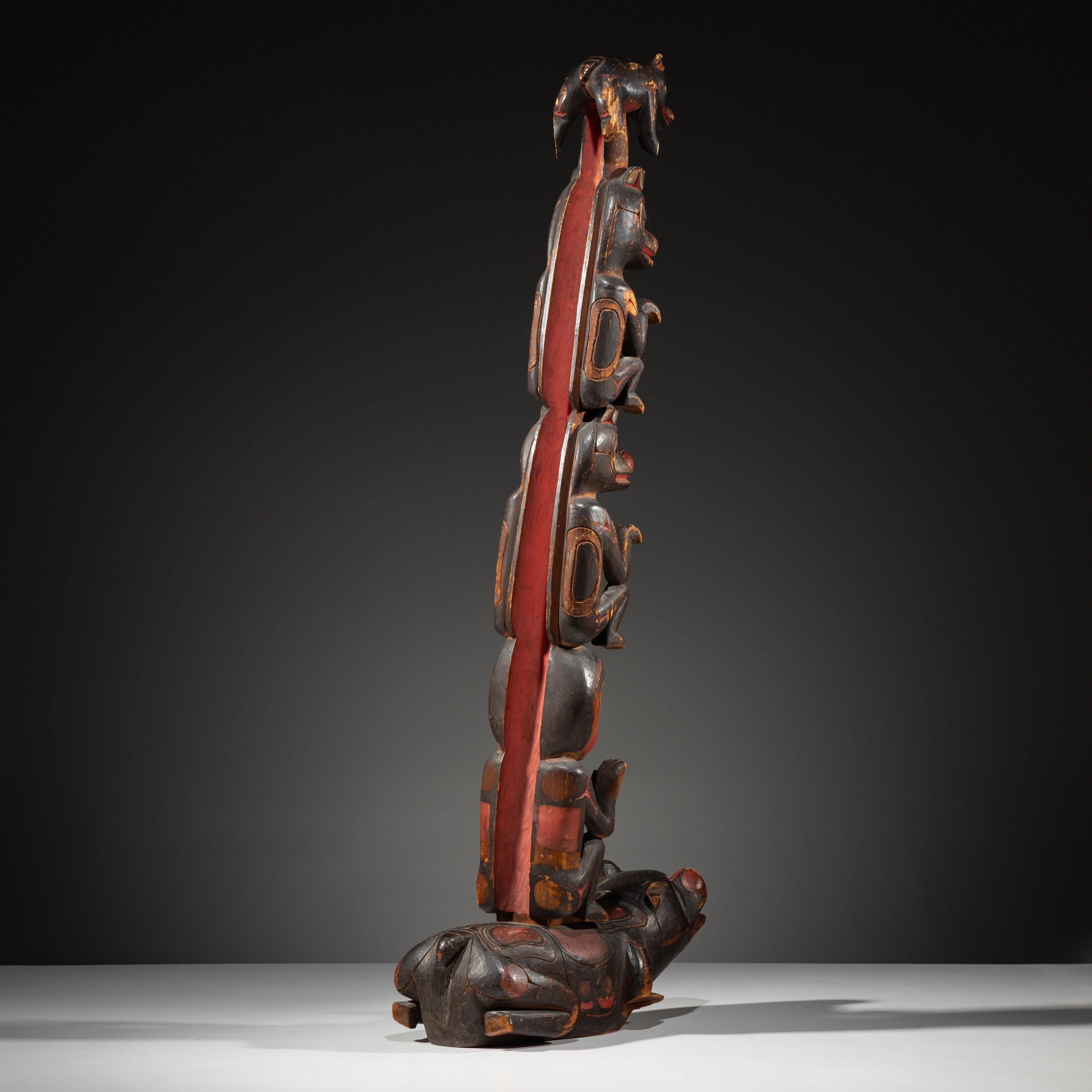 Haida Carved Totem Pole and Bear Cub