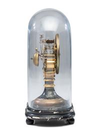 An Ebonized and Parcel Gilt Mantel Clock