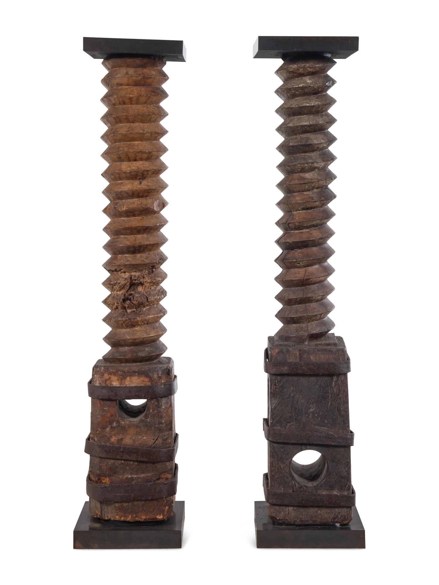 A Pair of French Iron Mounted Grape Presses Converted to Pedestals