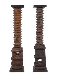 A Pair of French Iron Mounted Grape Presses Converted to Pedestals